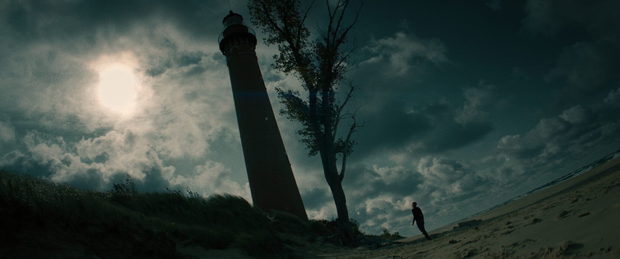 Fig. 5. "Jess (Adriana Isabel) at the Lighthouse," Directed by Matt Devino & David Yohe, THE DÆMON, 2024
 Moviehooker